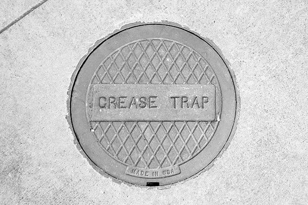 neglecting grease trap pumping can lead to sewage backups and costly repairs
